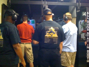 Instructors Leon S. Adams and Joseph Hibner coaching new shooting students on the firing line